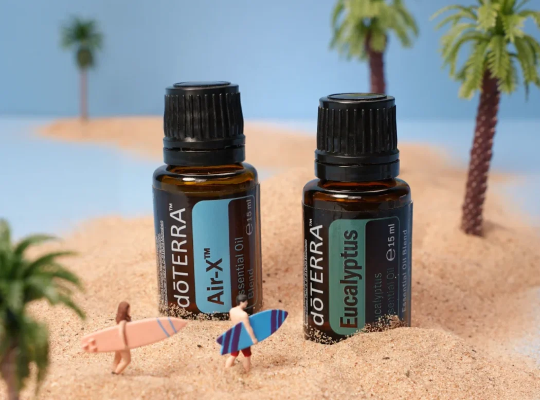 doTERRA Air-X mešavina i Eucalyptus eterično ulje uz grančice eukaliptusa